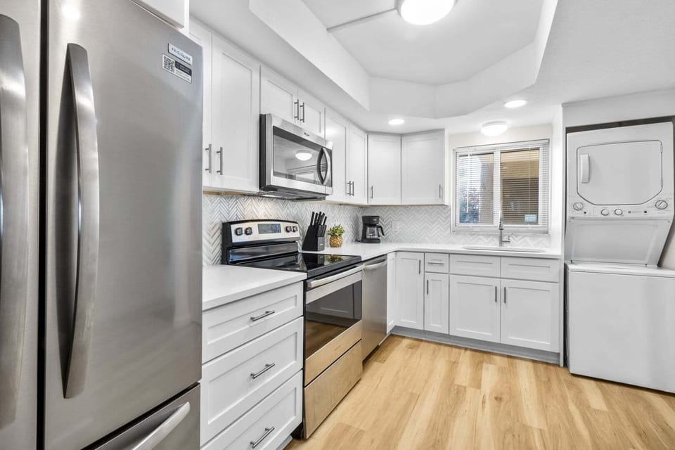 Washer & dryer located in kitchen