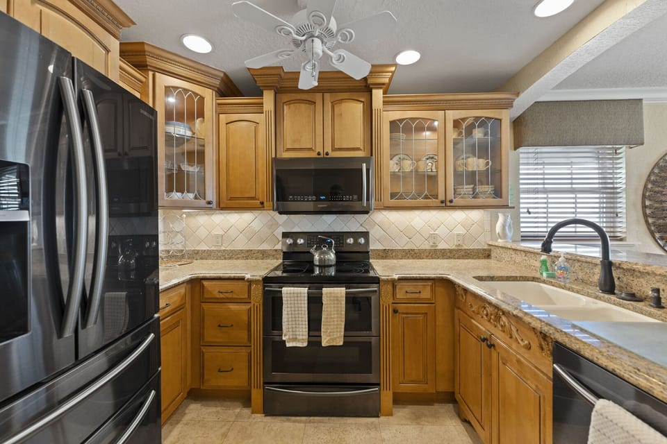 A fully equipped kitchen with modern appliances, designed for effortless cooking.