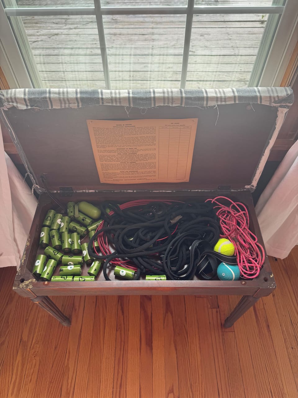 Pet supplies in the bench near the back door