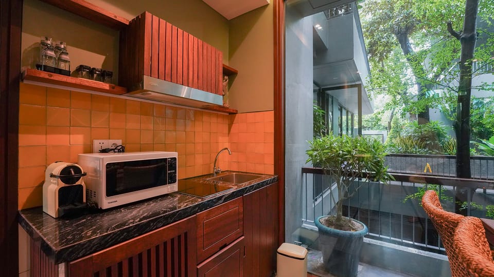 Luxury Suite, Garden View | Private kitchen | Mini-fridge, espresso maker, electric kettle, coffee grinder