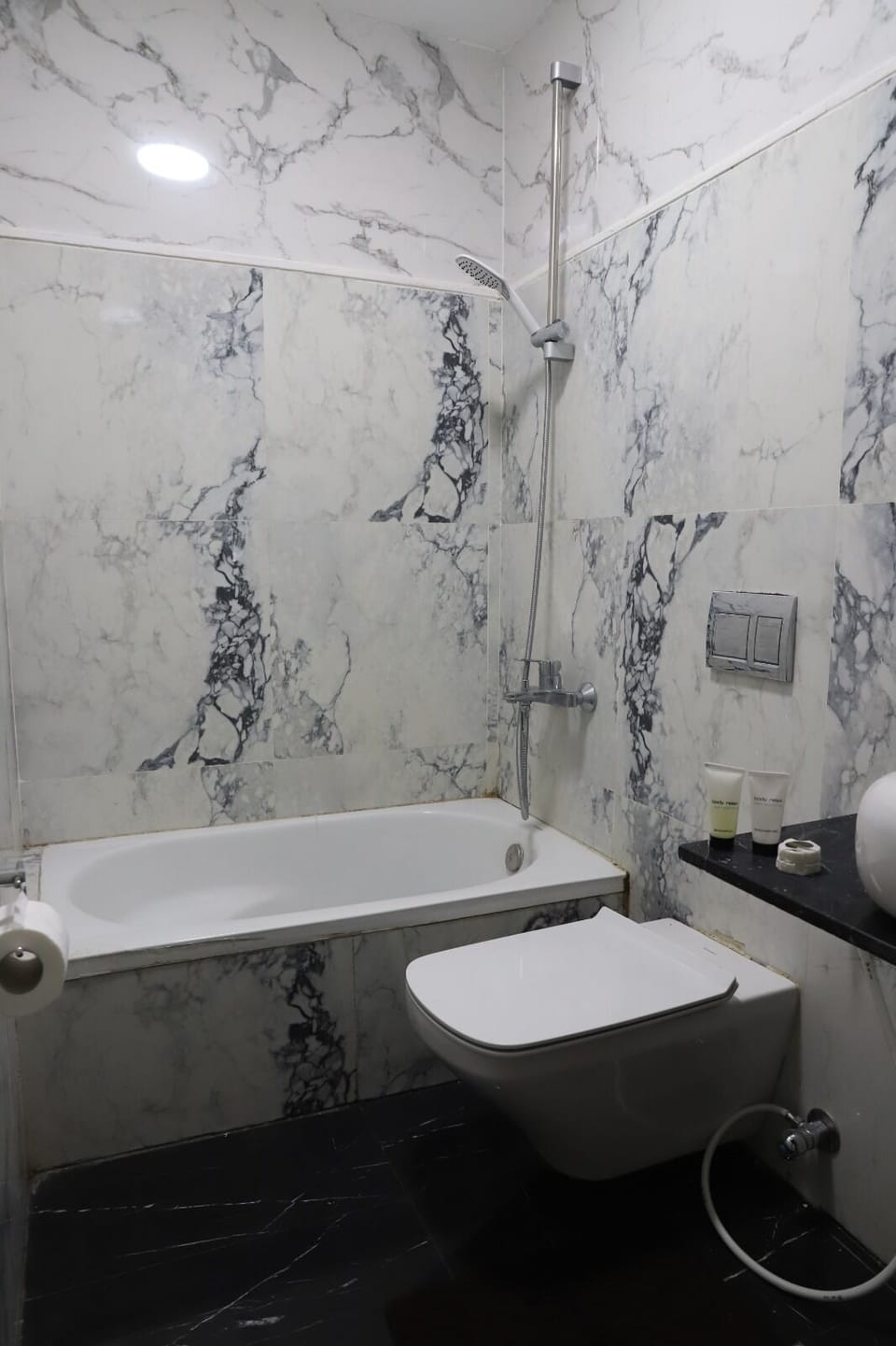 Shower, free toiletries, hair dryer, slippers
