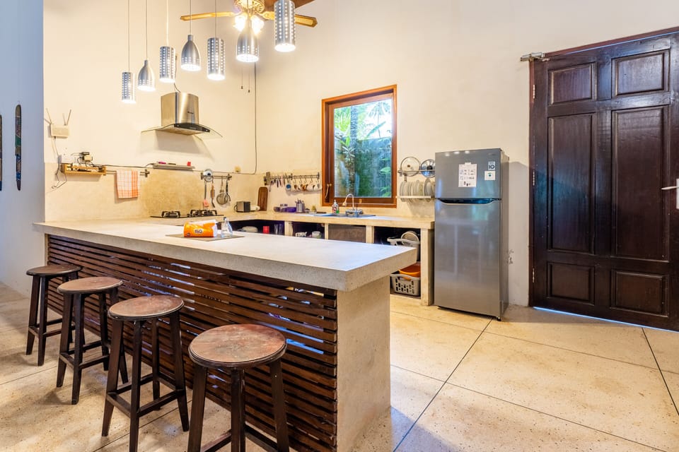 Fridge, stovetop, electric kettle, toaster