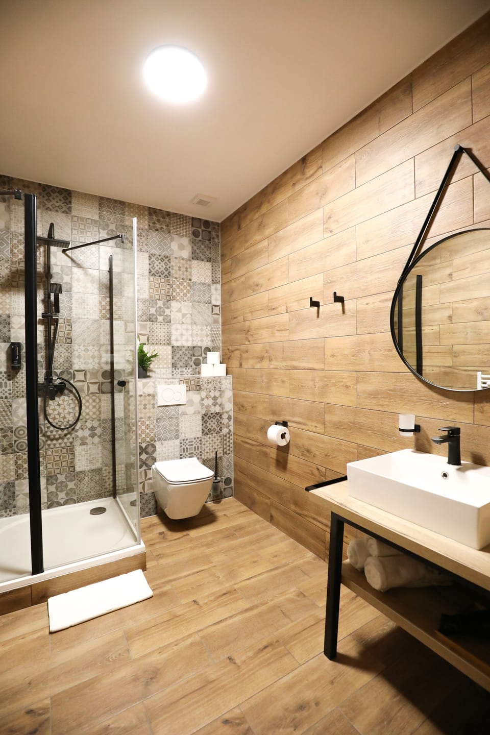 Shower, rainfall showerhead, hair dryer, towels