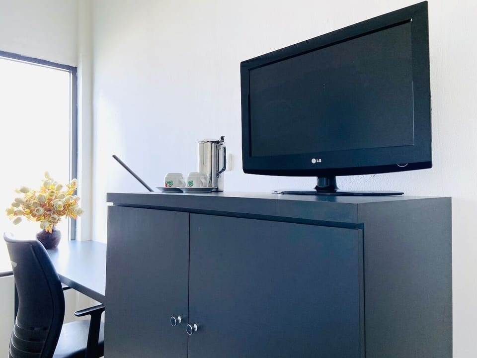 Pillowtop beds, desk, laptop workspace, free WiFi
