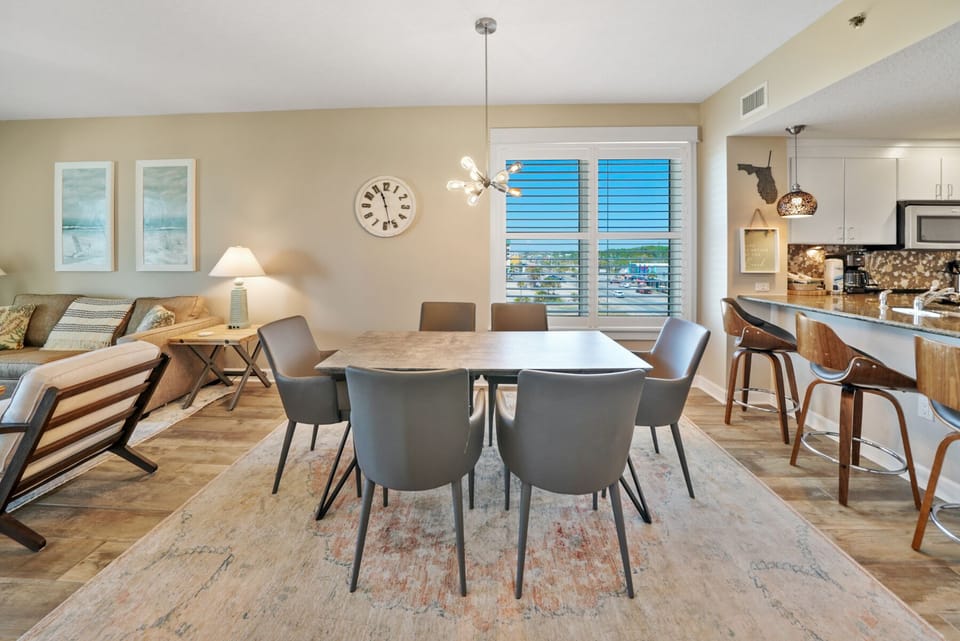 Gather around your elegant dining table where modern comfort meets warm hospitality—perfect for memorable meals together.