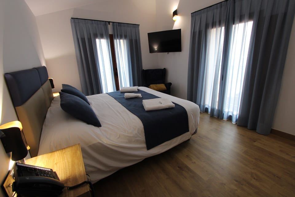 Superior Double Room, 1 Bedroom, Mountain View | In-room safe, blackout drapes, soundproofing, bed sheets