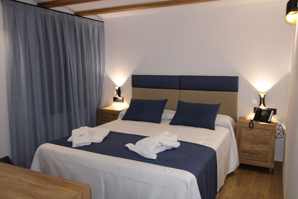 Superior Double Room, Private Bathroom, Mountain View | In-room safe, blackout drapes, soundproofing, bed sheets