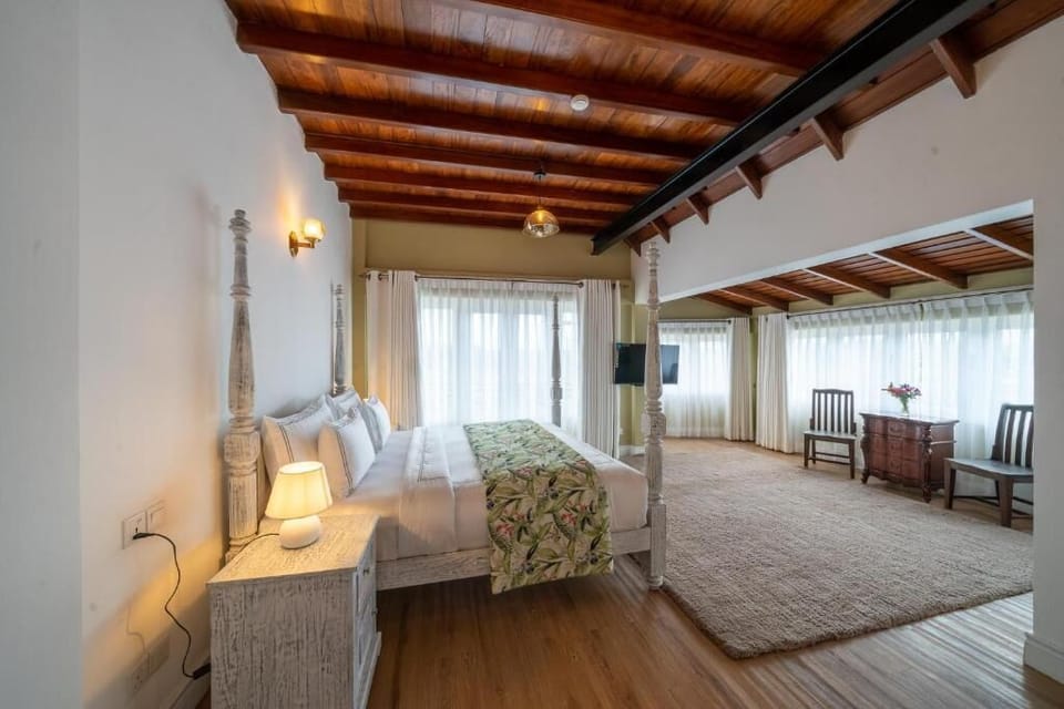 Grand Room | Premium bedding, down comforters, in-room safe, individually decorated