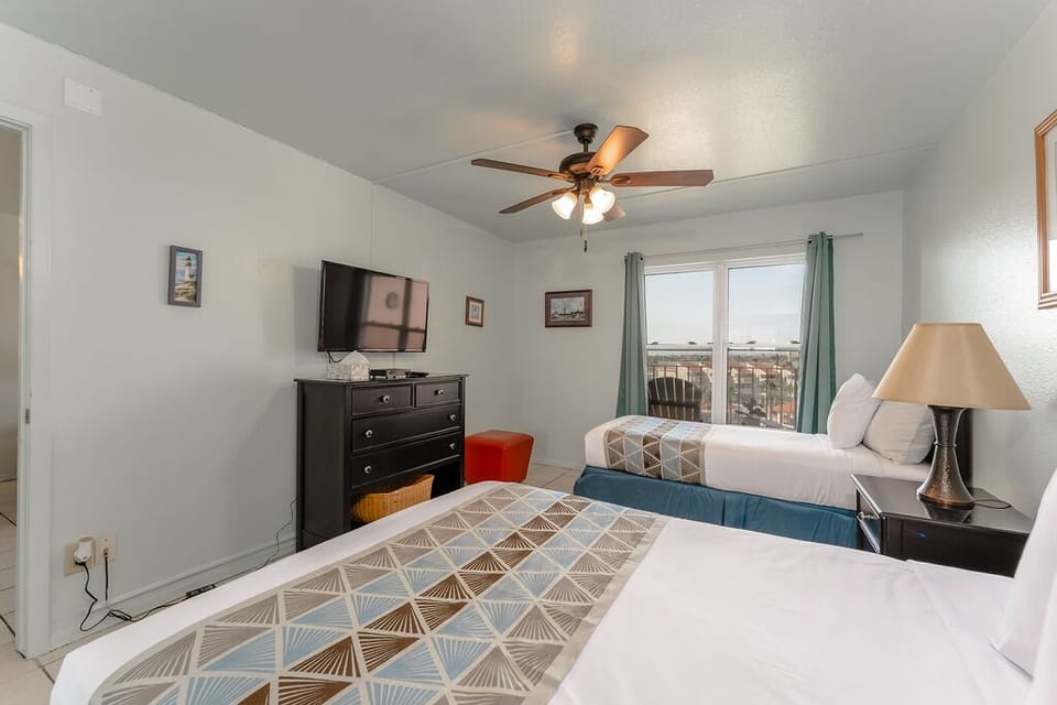 Your guests can unwind and relax in front of the TV after a warm day on the sand. 