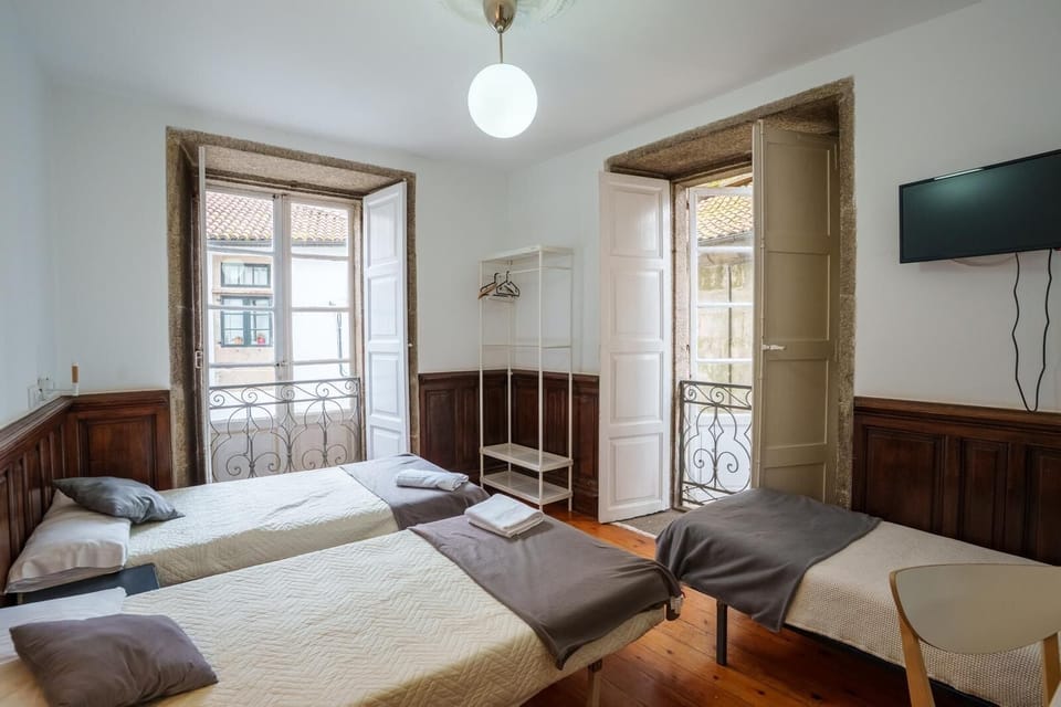 Standard Triple Room, Shared Bathroom | Desk, laptop workspace, free WiFi, bed sheets