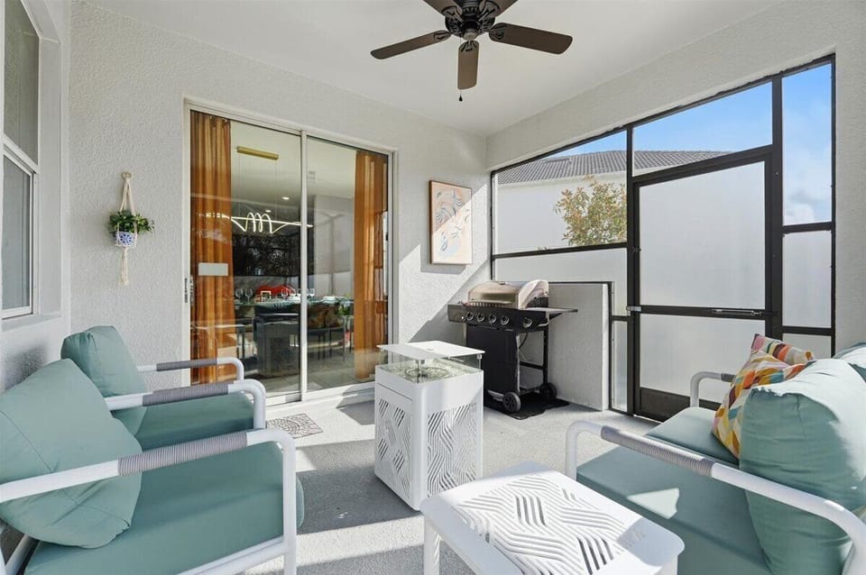 A cozy outdoor sit-out, perfect for morning coffee or relaxed evening chats.