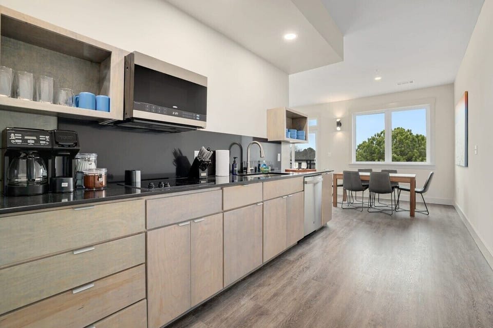 When you first walk into the loft, you'll immediately enter our kitchen and dining area.
