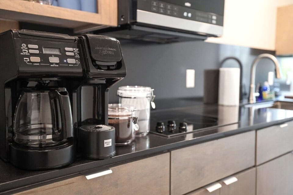 Our coffee station is fully stocked with everything you need to make the perfect cup.