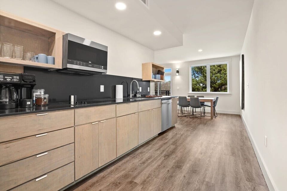 When you first walk into the loft, you'll immediately enter our kitchen and dining area.