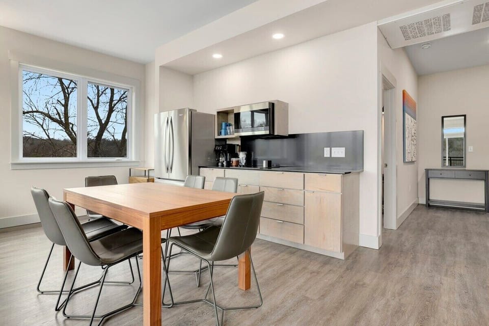 Walk through the kitchen and you'll find our six-top dining table.