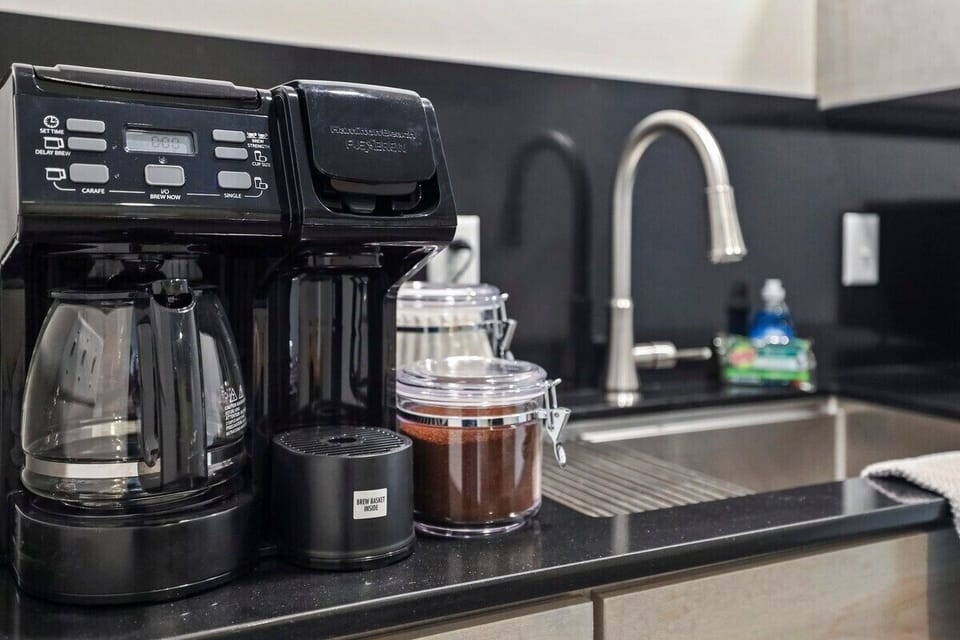 Our coffee station is fully stocked with everything you need to make the perfect cup.
