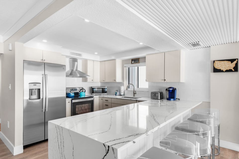 Kitchen with  eat-in bar seating