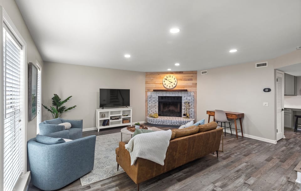 Spacious And Comfortable Living Area With 55" Smart TV and Fireplace