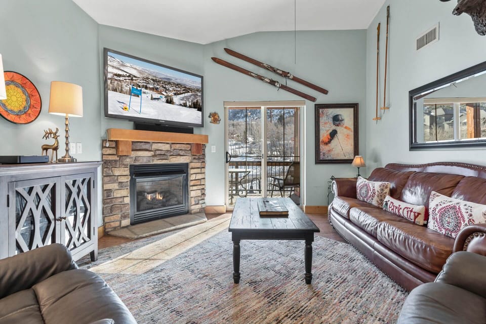 Vacation Rentals in Park City at Bear Hollow Lodges 1401: Living room with gas fireplace and private balcony
