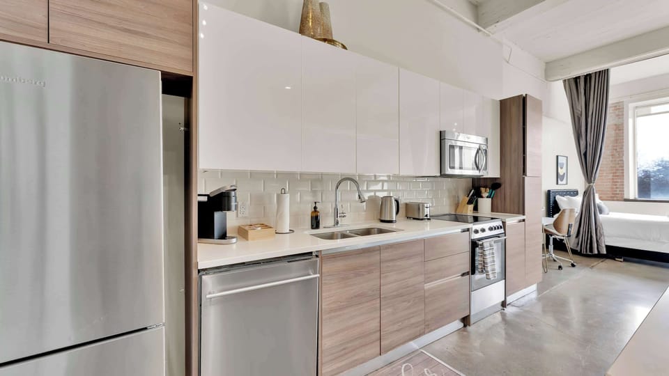 Stylish Kitchenette: Modern appliances and chic decor await your culinary adventures!