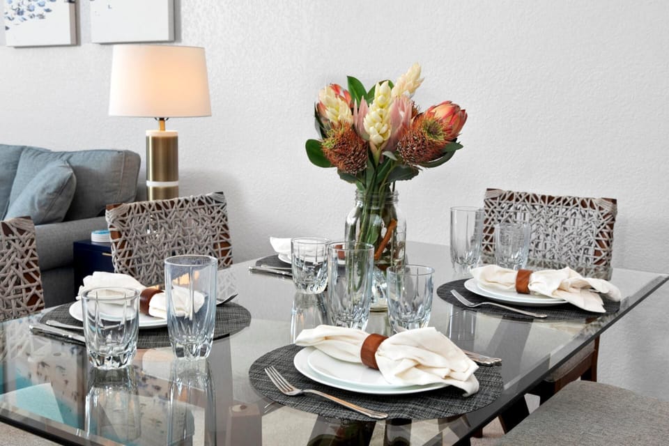     Leopard-spotted chairs and fresh tropical florals make every bite feel like a wild, luxurious adventure in paradise