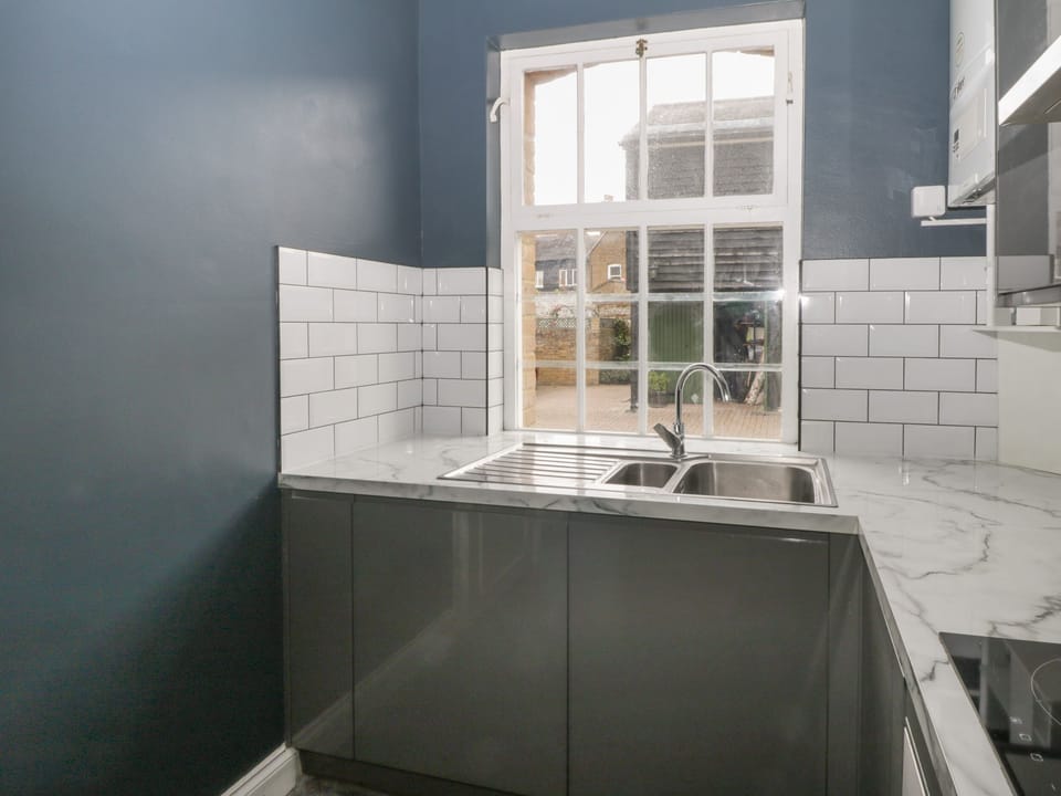 Fridge, electric kettle, toaster, cookware/dishes/utensils