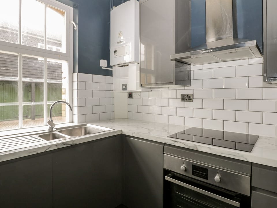Fridge, electric kettle, toaster, cookware/dishes/utensils