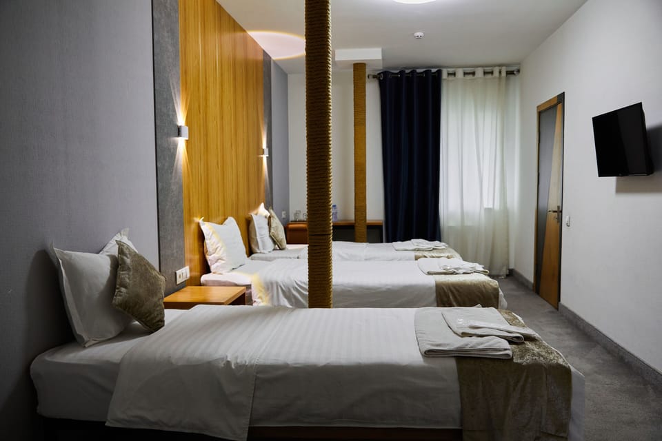Economy Triple Room | Premium bedding, desk, blackout drapes, soundproofing