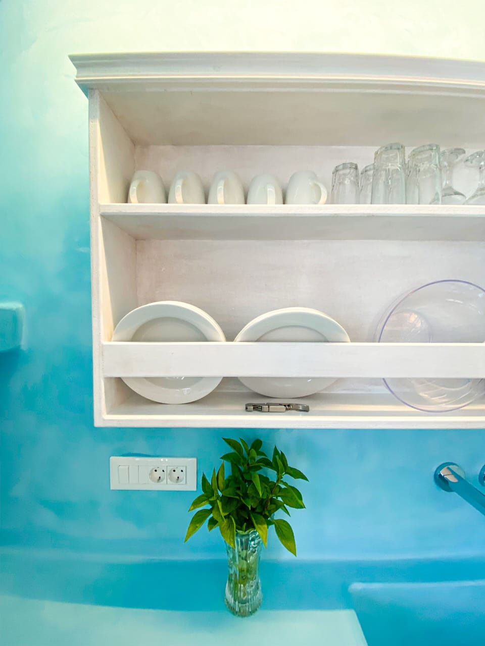 Mini-fridge, stovetop, electric kettle, cookware/dishes/utensils