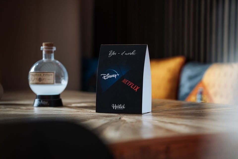 Desk, laptop workspace, blackout drapes, soundproofing