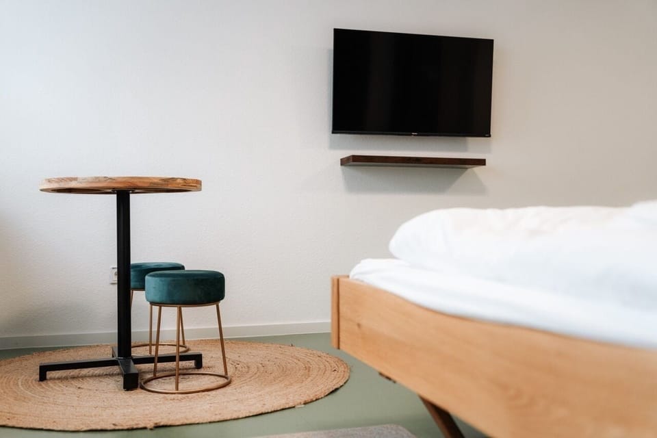 Desk, laptop workspace, blackout drapes, soundproofing