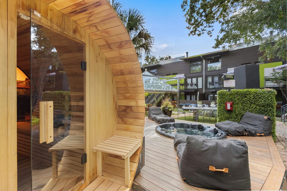 Custom-built cedar sauna for rejuvenation and spa-inspired comfort. Our jacuzzi and cold plunge are only steps away for the ultimate wellness experience. 
