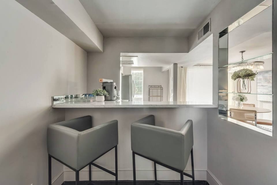 Stylish bar seating at the bar, perfect for casual meals or chatting with the chef.