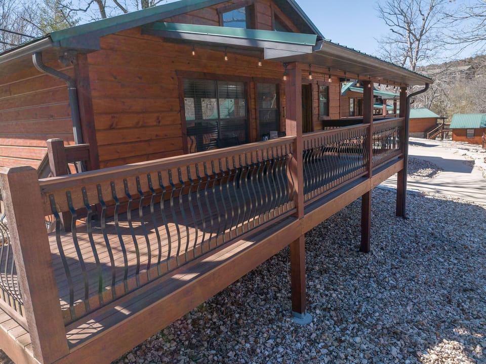 Large front porch welcomes you to Cast Away Cabin!