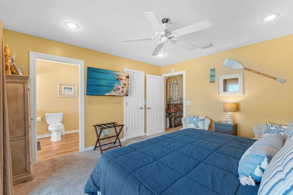 Wake up in luxury: king bed, tranquil views, and your own balcony overlooking the Gulf