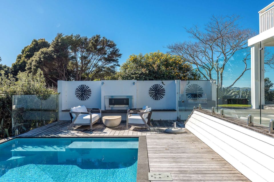 Pool and outdoor seating with gas fire place 