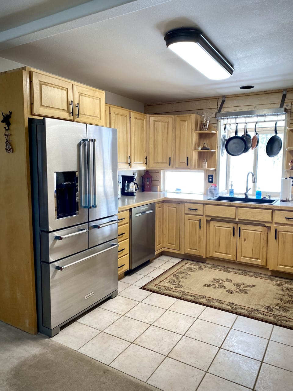 The well appointed kitchen features modern appliances...