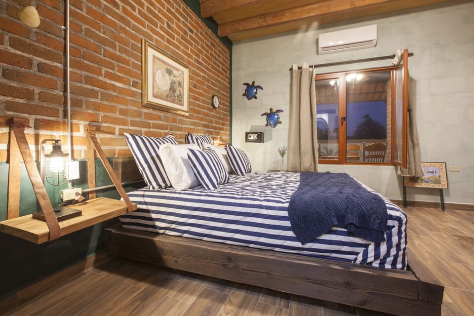 Signature Room | 1 bedroom, in-room safe, individually decorated, individually furnished