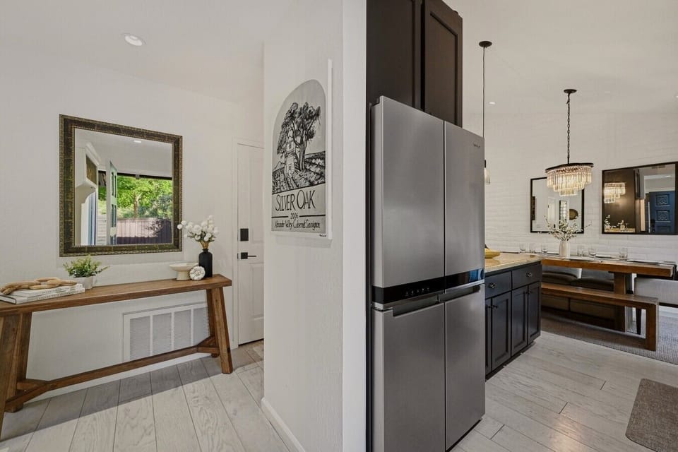 Stylish and functional. The updated kitchen sits at the heart of the home, providing easy access to the dining area, living room, and outdoor patio.