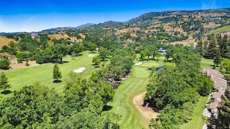 An aerial view of the north golf course and valley views just off the condo