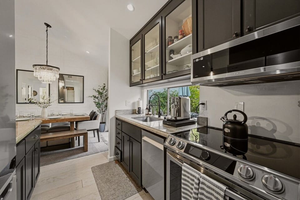 Cook like you`re at home. This remodeled kitchen features stainless steel appliances, ample counter space, and everything needed to prepare breakfast before golf or dinner after wine tasting