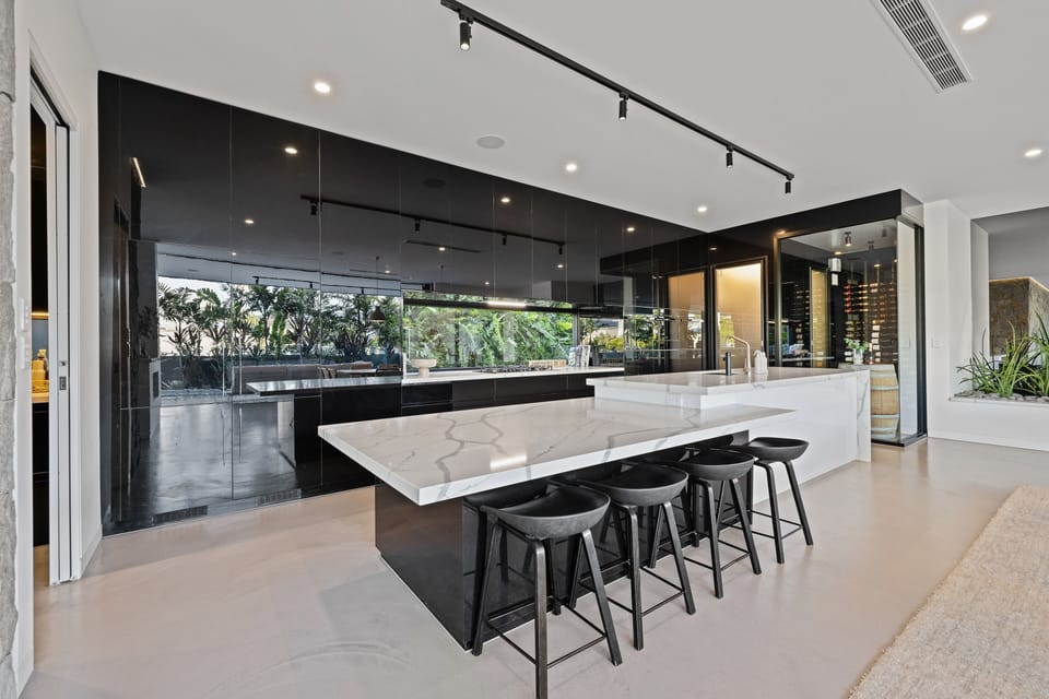 Entertainers kitchen with pantry, cool-room and breakfast bar seating for 4