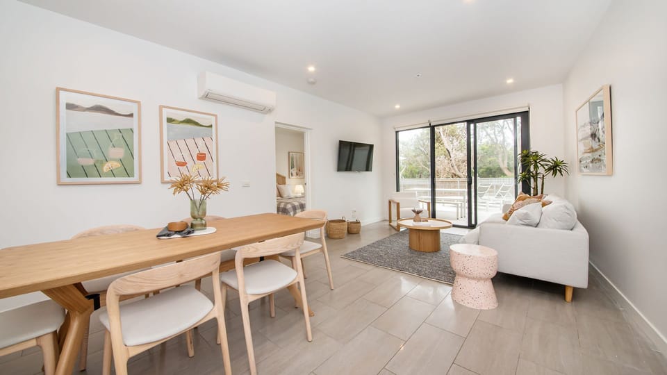 Spacious lounge and dining with lots of natural light shining through 
