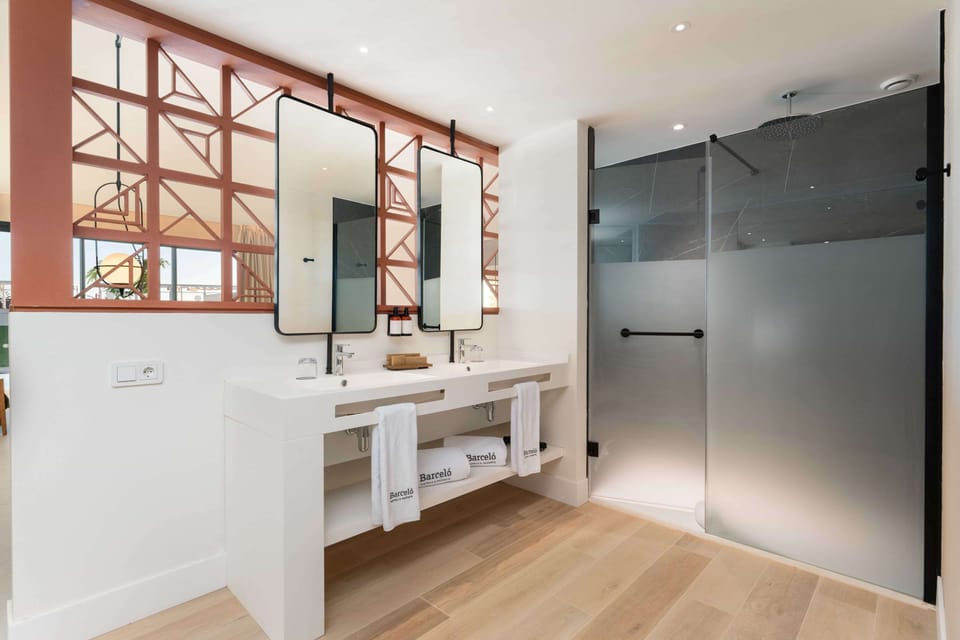 Eco-friendly toiletries, hair dryer, bathrobes, slippers