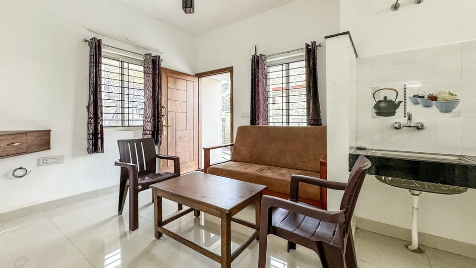 Premium Room | Living area | LED TV, fireplace