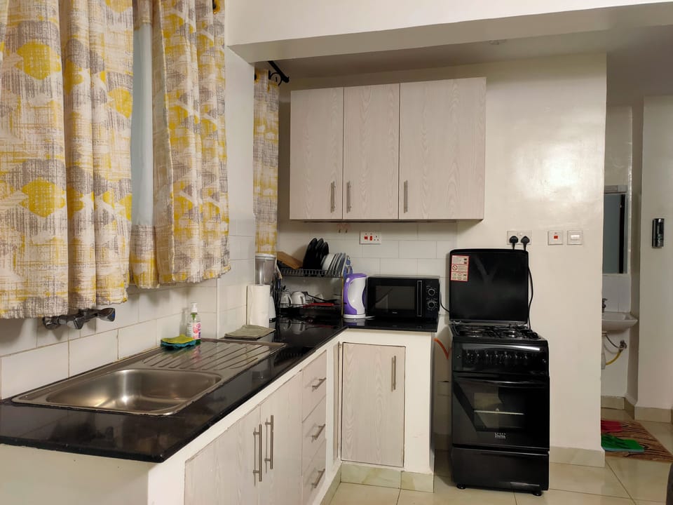 Apartment | Private kitchen | Fridge, microwave, oven, electric kettle