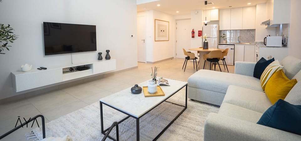 Premium Apartment, 1 Bedroom | Living area | 55-inch Smart TV with cable channels, TV, Netflix
