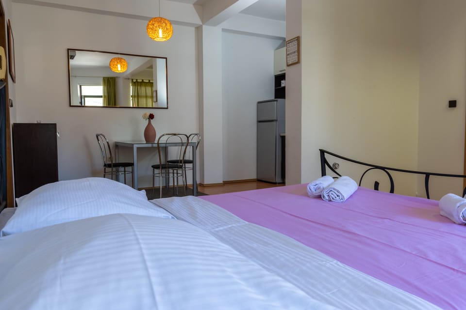 Studio apartment with queen bed.