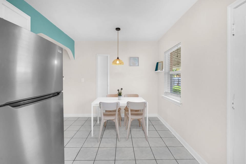 Dining table provides a cozy setting for your meals and can comfortably accommodate up to four people.