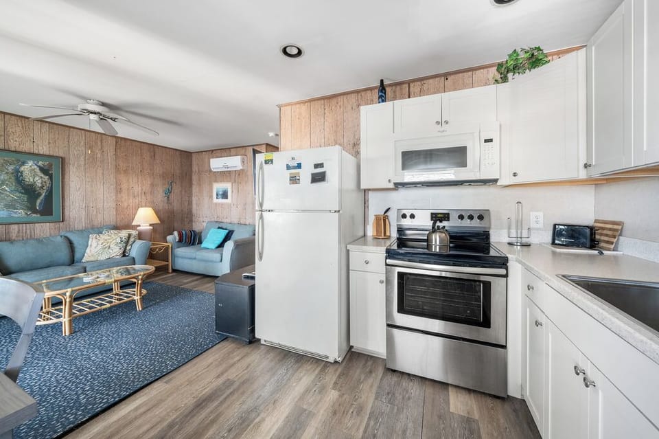 The Kitchen is light, bright, and beachy.